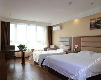 Greentree Inn Weifang An'qiu Bus Station Heping East Road Hotel - Weifang - Habitación