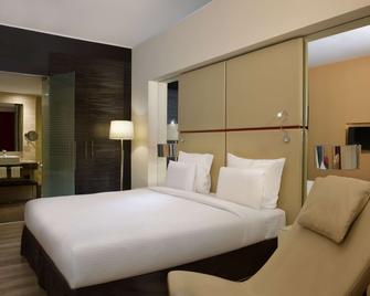 Pullman Kinshasa Grand Hotel - Kinshasa - Schlafzimmer