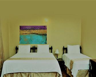 Randi Homestay - נגומבו - חדר שינה