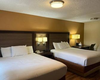 Sunrise Motor Inn - Cody - Bedroom