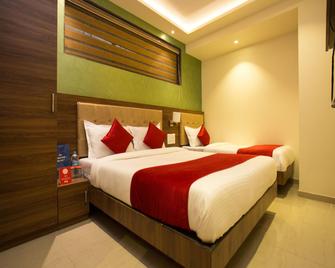 Hotel Highland Residency - Thane - Ložnice