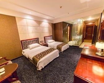 Milan Holiday Hotel - Nanchang - Bedroom