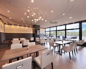 Deluxe Twin Room Nonsmoking 39 square meters R / Suita Ōsaka - Suita - Restaurant