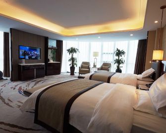 Dongsheng Hongfu Hotel - Changji - Bedroom