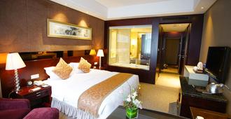 Grand Soluxe International Hotel Xi'an - Xi'an - Camera da letto