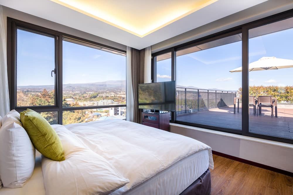 Parksunshine Jeju - סאוגוויפו - חדר שינה