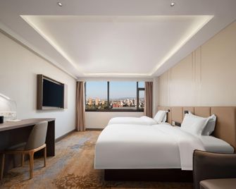 Rose Hotel - Zibo - Спальня