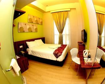 Sri Manja Boutique Hotel - Kuantan - Slaapkamer