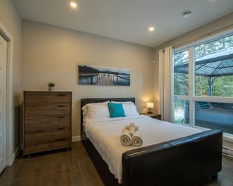 Le Distingué, waterfront - Rawdon - Camera da letto