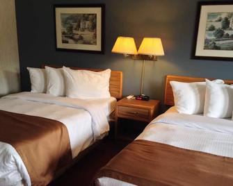 Bancroft Inn & Suites - Bancroft - Спальня