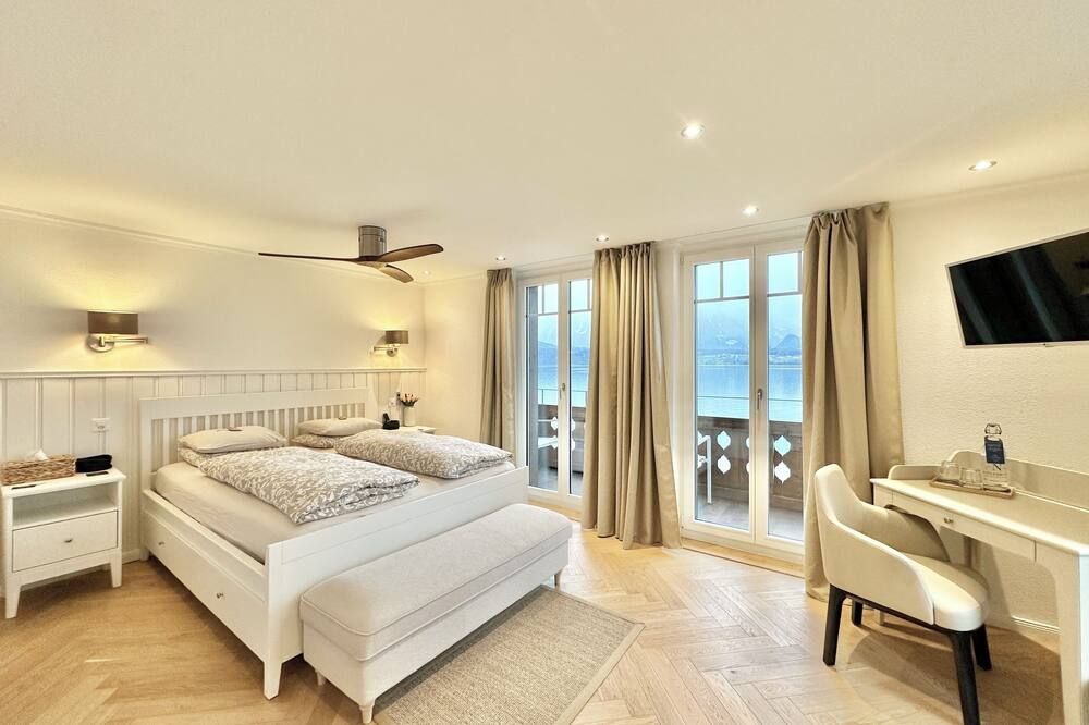 Boutique Hotel Niesenblick - Direkt Am Thunersee Gelegen Mit Self Check In & Digitaler Rezeption