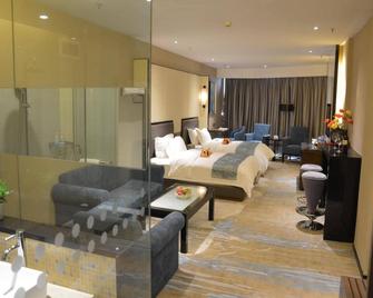 Nanning Champs Elysees Hotel - Nanning - Bedroom