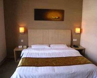 Super 8 by Wyndham Beijing Guo Zhan - Beijing - Bedroom