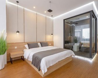 Xiamen Fenger Villa (Huangcuo Tatou Road Branch) - Xiamen - Camera da letto