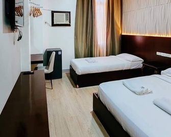 Bamboo Garden Business Inn - Dipólog - Habitación