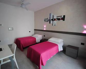 Novo Motel - Montone - Habitación