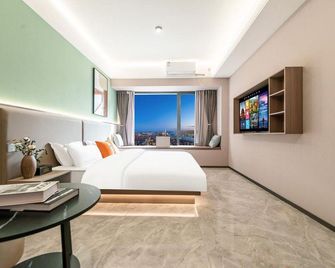 Xi'an Yuehao Light Luxury Homestay (Country Garden Jinli Dafengge Subway Station) - Xi'an - Bedroom