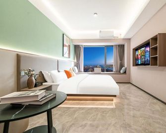 Xi'an Yuehao Light Luxury Homestay (Country Garden Jinli Dafengge Subway Station) - Xi'an - Bedroom