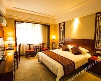 Sanqingshan Jinshawan Holiday Hotel - Shangrao - Shangrao - Schlafzimmer
