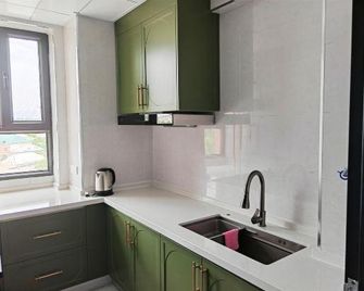 Qianlixianghui Film and Television Homestay (Yizhao Highway) - Ili - Küche