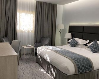 Seven Garden Palace - الطائف - غرفة نوم