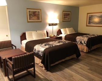 Budget Host Inn - Sheridan - Bedroom