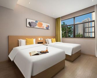 Mu Lan Zun Yue Hotel (Guiyuan Temple Branch, Wuhan National Expo Center) - Wuhan - Habitación