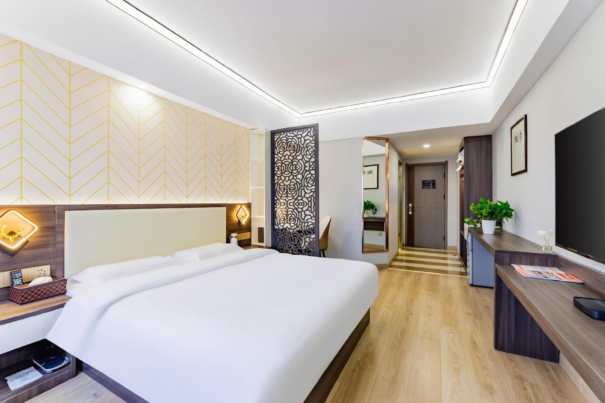 Chang An Jin Zuo Hotel - הוהוט - חדר שינה