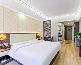 Chang An Jin Zuo Hotel - Hohhot - Kamar Tidur