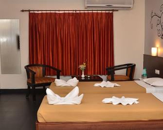Abirami Residency - Tharangambadi - Camera da letto