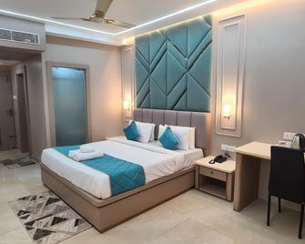 Hotel Jeevan Sandhya - Puri - Phòng ngủ