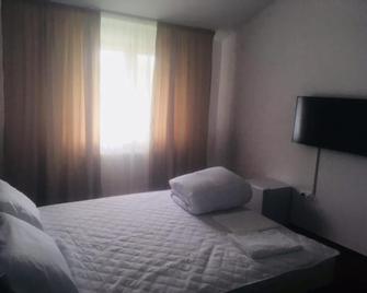 Hotel Ostrov - Calimanesti Caciulata - Bedroom