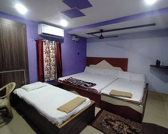 Hotel Sea Dream Lodge - פורי - חדר שינה