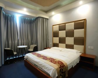 Yueyang Business Inn - Chengdu - Habitación