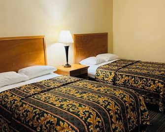 Executive Inn & Suites - Richmond
