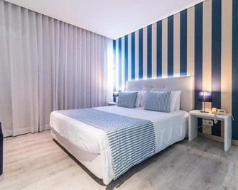 Costa de Prata Hotel - פיגרה דה פוז - חדר שינה