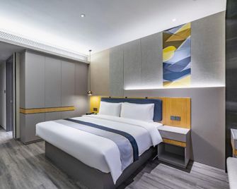 Homeinn Selected Hotel (Urumqi Xinbei Yuanchun Agricultural University Store) - أورومتشي - غرفة نوم