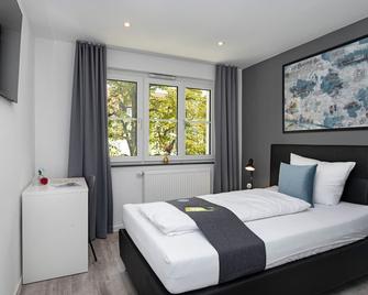 Hotel Das Q Spaichingen - Spaichingen - Schlafzimmer