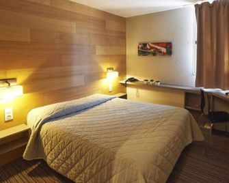 Cit'Hotel Les Alizés - Limoges - Bedroom