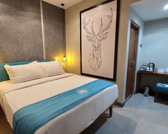 Hotel Dafam Wonosobo - Wonosobo - Bedroom