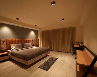 Aura Crimson Vistas - Kodaikanal - Schlafzimmer