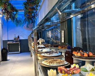 Hotel Palmas Executivo - Balneário Camboriú - Buffet