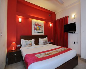 OYO Flagship 494 East of Kailash - New Delhi - Bedroom