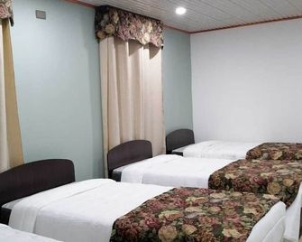 Hostal Chiloe Travel - Dalcahue - Schlafzimmer