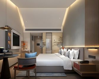 Greentree Eastern Hotel Guangxi Yulin East Renmin Road Cultrue Square Wanda Plaza - Yulin - Habitación