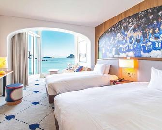 Nichinankaigan Nango Prince Hotel - Nichinan - Schlafzimmer