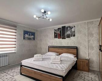 Arbat Toktogul Hotel - Toktogul - Camera da letto