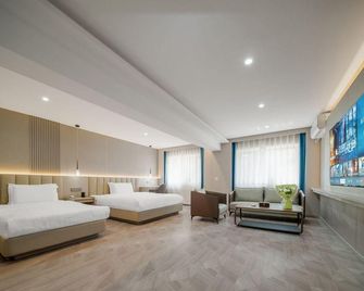7 Days Inn Dalian Xian Road Business Center Xinggong Street Subway Station Branch - Dalian - Bedroom
