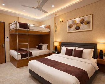 Travinities Premier, Ujjain - Ujjain - Camera da letto