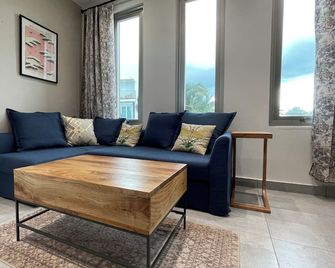 Cozy 1BR private apartment in Aguadilla near restaurants, beaches & airport. - Aguadilla - Huiskamer